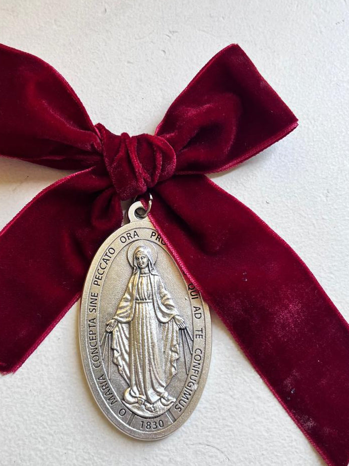 Medalla cunero con imagen de la Virgen